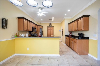 Welcome to this stunning 3-bedroom, 2-bath Eaton model home with on Kings Gate Golf Club in Florida - for sale on GolfHomes.com, golf home, golf lot