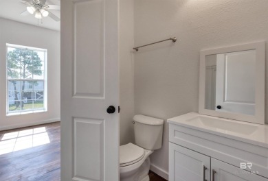 Ready for rental season with this versatile beach house! Totally on Kiva Dunes Golf Club in Alabama - for sale on GolfHomes.com, golf home, golf lot