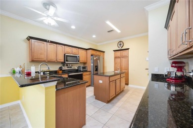 Welcome to this stunning 3-bedroom, 2-bath Eaton model home with on Kings Gate Golf Club in Florida - for sale on GolfHomes.com, golf home, golf lot