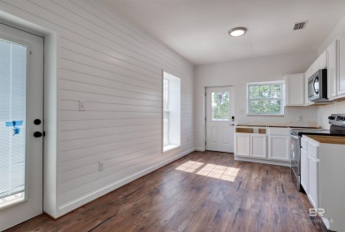 Ready for rental season with this versatile beach house! Totally on Kiva Dunes Golf Club in Alabama - for sale on GolfHomes.com, golf home, golf lot