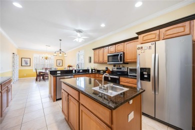 Welcome to this stunning 3-bedroom, 2-bath Eaton model home with on Kings Gate Golf Club in Florida - for sale on GolfHomes.com, golf home, golf lot