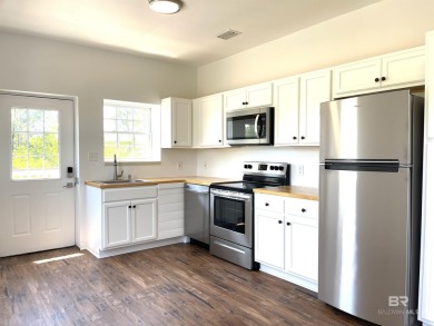 Ready for rental season with this versatile beach house! Totally on Kiva Dunes Golf Club in Alabama - for sale on GolfHomes.com, golf home, golf lot
