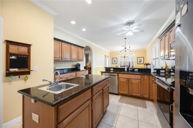 Welcome to this stunning 3-bedroom, 2-bath Eaton model home with on Kings Gate Golf Club in Florida - for sale on GolfHomes.com, golf home, golf lot