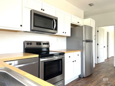 Ready for rental season with this versatile beach house! Totally on Kiva Dunes Golf Club in Alabama - for sale on GolfHomes.com, golf home, golf lot