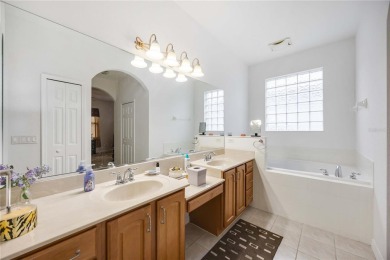 Welcome to this stunning 3-bedroom, 2-bath Eaton model home with on Kings Gate Golf Club in Florida - for sale on GolfHomes.com, golf home, golf lot