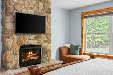 Stunning, custom-built log home overlooking the 16th tee & on Cedar River Golf Course in Michigan - for sale on GolfHomes.com, golf home, golf lot