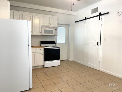 Ready for rental season with this versatile beach house! Totally on Kiva Dunes Golf Club in Alabama - for sale on GolfHomes.com, golf home, golf lot
