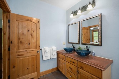 Stunning, custom-built log home overlooking the 16th tee & on Cedar River Golf Course in Michigan - for sale on GolfHomes.com, golf home, golf lot