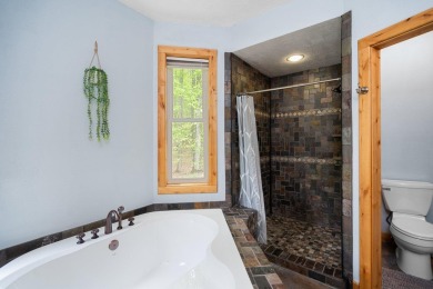 Stunning, custom-built log home overlooking the 16th tee & on Cedar River Golf Course in Michigan - for sale on GolfHomes.com, golf home, golf lot