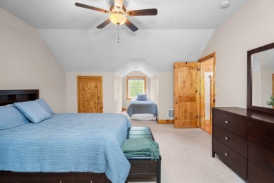 Stunning, custom-built log home overlooking the 16th tee & on Cedar River Golf Course in Michigan - for sale on GolfHomes.com, golf home, golf lot