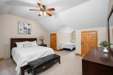 Stunning, custom-built log home overlooking the 16th tee & on Cedar River Golf Course in Michigan - for sale on GolfHomes.com, golf home, golf lot
