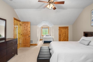 Stunning, custom-built log home overlooking the 16th tee & on Cedar River Golf Course in Michigan - for sale on GolfHomes.com, golf home, golf lot