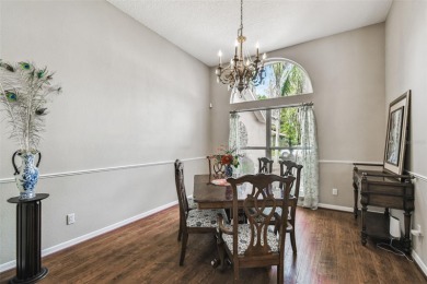 Stunning 4BR/2.5BA pool home on an oversized lot in the gated on East Lake Woodlands Country Club in Florida - for sale on GolfHomes.com, golf home, golf lot