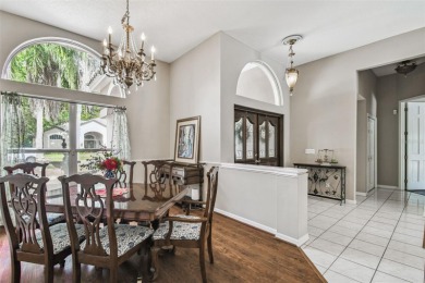Stunning 4BR/2.5BA pool home on an oversized lot in the gated on East Lake Woodlands Country Club in Florida - for sale on GolfHomes.com, golf home, golf lot