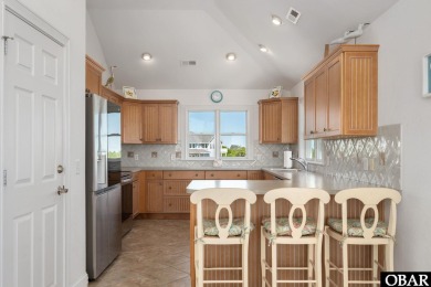 Set along the renowned Rees Jones-designed golf course in the on The Currituck Golf Club in North Carolina - for sale on GolfHomes.com, golf home, golf lot