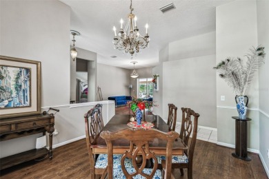 Stunning 4BR/2.5BA pool home on an oversized lot in the gated on East Lake Woodlands Country Club in Florida - for sale on GolfHomes.com, golf home, golf lot
