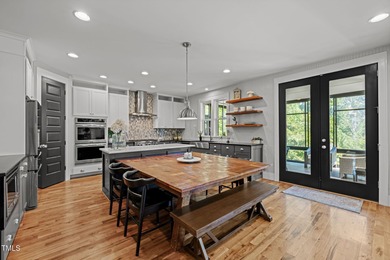 This stunning 7-bedroom, 6-bathroom custom-crafted home located on The Club At Twelve Oaks in North Carolina - for sale on GolfHomes.com, golf home, golf lot