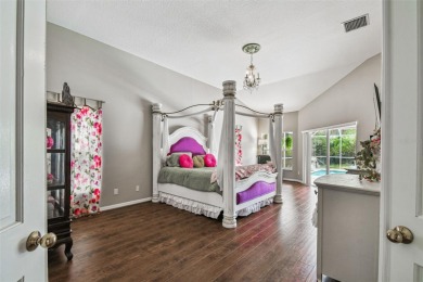 Stunning 4BR/2.5BA pool home on an oversized lot in the gated on East Lake Woodlands Country Club in Florida - for sale on GolfHomes.com, golf home, golf lot