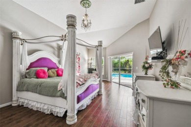 Stunning 4BR/2.5BA pool home on an oversized lot in the gated on East Lake Woodlands Country Club in Florida - for sale on GolfHomes.com, golf home, golf lot
