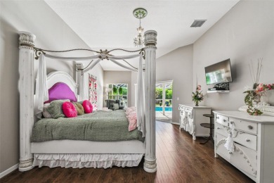 Stunning 4BR/2.5BA pool home on an oversized lot in the gated on East Lake Woodlands Country Club in Florida - for sale on GolfHomes.com, golf home, golf lot