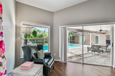 Stunning 4BR/2.5BA pool home on an oversized lot in the gated on East Lake Woodlands Country Club in Florida - for sale on GolfHomes.com, golf home, golf lot