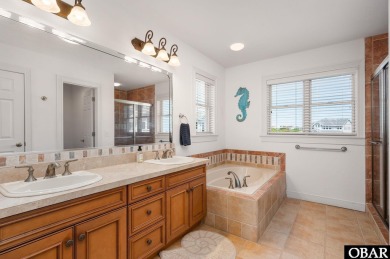 Set along the renowned Rees Jones-designed golf course in the on The Currituck Golf Club in North Carolina - for sale on GolfHomes.com, golf home, golf lot