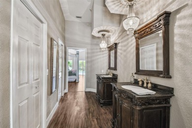 Stunning 4BR/2.5BA pool home on an oversized lot in the gated on East Lake Woodlands Country Club in Florida - for sale on GolfHomes.com, golf home, golf lot