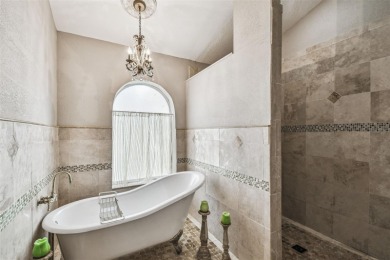 Stunning 4BR/2.5BA pool home on an oversized lot in the gated on East Lake Woodlands Country Club in Florida - for sale on GolfHomes.com, golf home, golf lot