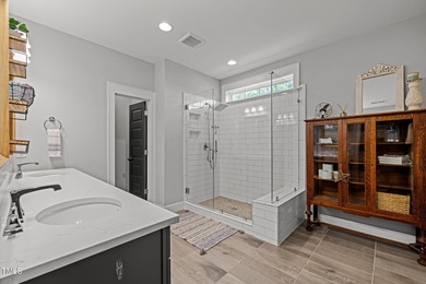 This stunning 7-bedroom, 6-bathroom custom-crafted home located on The Club At Twelve Oaks in North Carolina - for sale on GolfHomes.com, golf home, golf lot