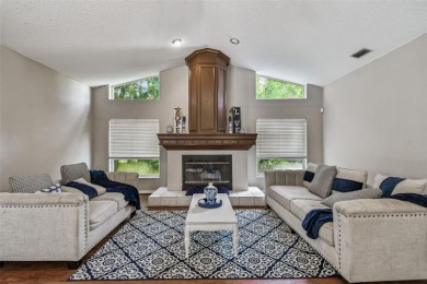 Stunning 4BR/2.5BA pool home on an oversized lot in the gated on East Lake Woodlands Country Club in Florida - for sale on GolfHomes.com, golf home, golf lot
