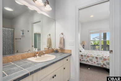 Set along the renowned Rees Jones-designed golf course in the on The Currituck Golf Club in North Carolina - for sale on GolfHomes.com, golf home, golf lot