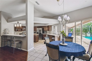 Stunning 4BR/2.5BA pool home on an oversized lot in the gated on East Lake Woodlands Country Club in Florida - for sale on GolfHomes.com, golf home, golf lot