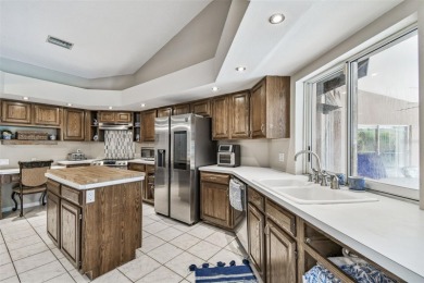 Stunning 4BR/2.5BA pool home on an oversized lot in the gated on East Lake Woodlands Country Club in Florida - for sale on GolfHomes.com, golf home, golf lot