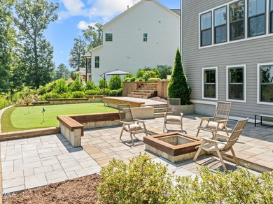 This stunning 7-bedroom, 6-bathroom custom-crafted home located on The Club At Twelve Oaks in North Carolina - for sale on GolfHomes.com, golf home, golf lot