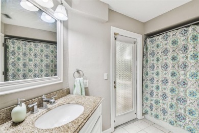 Stunning 4BR/2.5BA pool home on an oversized lot in the gated on East Lake Woodlands Country Club in Florida - for sale on GolfHomes.com, golf home, golf lot