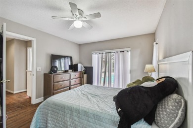 Stunning 4BR/2.5BA pool home on an oversized lot in the gated on East Lake Woodlands Country Club in Florida - for sale on GolfHomes.com, golf home, golf lot