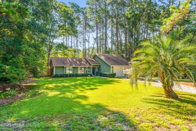 Welcome to your dream retreat! This stunning 3-bedroom on Ladys Island Country Club in South Carolina - for sale on GolfHomes.com, golf home, golf lot