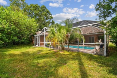 Stunning 4BR/2.5BA pool home on an oversized lot in the gated on East Lake Woodlands Country Club in Florida - for sale on GolfHomes.com, golf home, golf lot