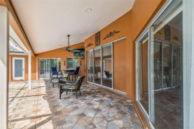 Stunning 4BR/2.5BA pool home on an oversized lot in the gated on East Lake Woodlands Country Club in Florida - for sale on GolfHomes.com, golf home, golf lot