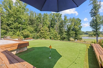 This stunning 7-bedroom, 6-bathroom custom-crafted home located on The Club At Twelve Oaks in North Carolina - for sale on GolfHomes.com, golf home, golf lot