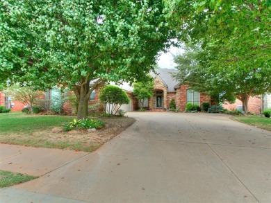 Beautiful golf course lot that backs to hole 15 on the west side on Oak Tree National Golf and Country Club in Oklahoma - for sale on GolfHomes.com, golf home, golf lot