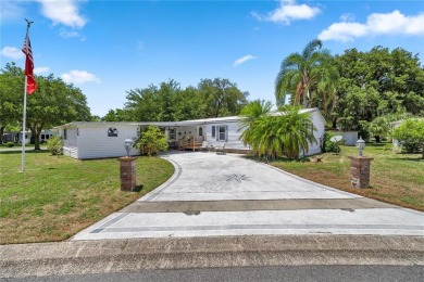 Welcome to this charming, manufactured home featuring two on Silver Lake Executive Golf Course in Florida - for sale on GolfHomes.com, golf home, golf lot