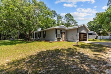 One or more photo(s) has been virtually staged. Gracious living on Rainbows End Golf Club in Florida - for sale on GolfHomes.com, golf home, golf lot