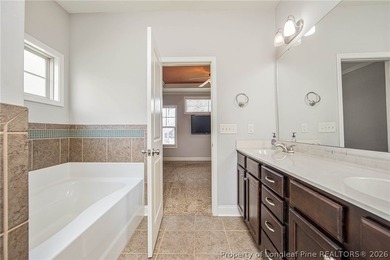 Refined Craftsman nestled in desirable King's Grant Golf & on Kings Grant Golf and Country Club in North Carolina - for sale on GolfHomes.com, golf home, golf lot