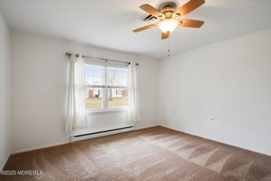 This meticulously maintained end-unit duplex in Leisure Village on Leisure Village East in New Jersey - for sale on GolfHomes.com, golf home, golf lot