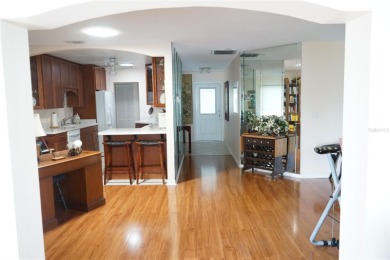 This attached home is located in Kings Point, one of Florida's on Falcon Watch Golf Club in Florida - for sale on GolfHomes.com, golf home, golf lot