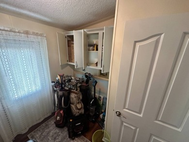 This well cared for 2-bedroom, 2 bathrooms Palm Harbor home on Del Tura Golf and Country Club in Florida - for sale on GolfHomes.com, golf home, golf lot