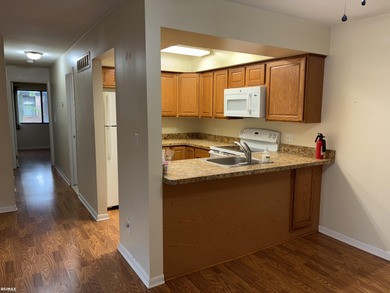 A great little condo in a great location! Overlooking the Maple on Plum Brook Golf Club in Michigan - for sale on GolfHomes.com, golf home, golf lot