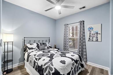 This beautiful three bedroom two bathroom furnished end unit is on Barefoot Resort and Golf Club  in South Carolina - for sale on GolfHomes.com, golf home, golf lot