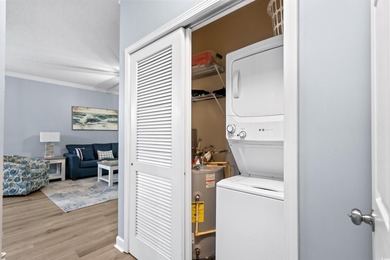 This beautiful three bedroom two bathroom furnished end unit is on Barefoot Resort and Golf Club  in South Carolina - for sale on GolfHomes.com, golf home, golf lot